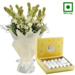 # A Sweets Combo - A Box of Kaju Katli (Half Kg) + 10 Fragrant Rajnigandhas Bunch