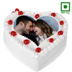 A Premium Pineapple Flavor Heart Shape Photo Printed Cake