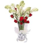 # A Beautiful Bunch of 10 Fragrant Rajnigandhas & 10 Red Roses in Glass Vase